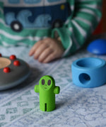 Close up of the green alien figure from the Bajo Alien Flying Saucer.