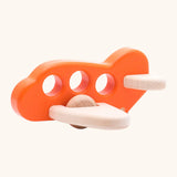 Bajo Toys wooden push along airplane in orange with 3 cut out holes as window, unpainted wings and wheels