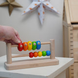 Bajo Sparrow Abacus wooden toy. This abacus has 5 little birds and 5 round counters. These heirloom quality toys by Bajo are part of a wide range of wooden toys available here at Babipur.