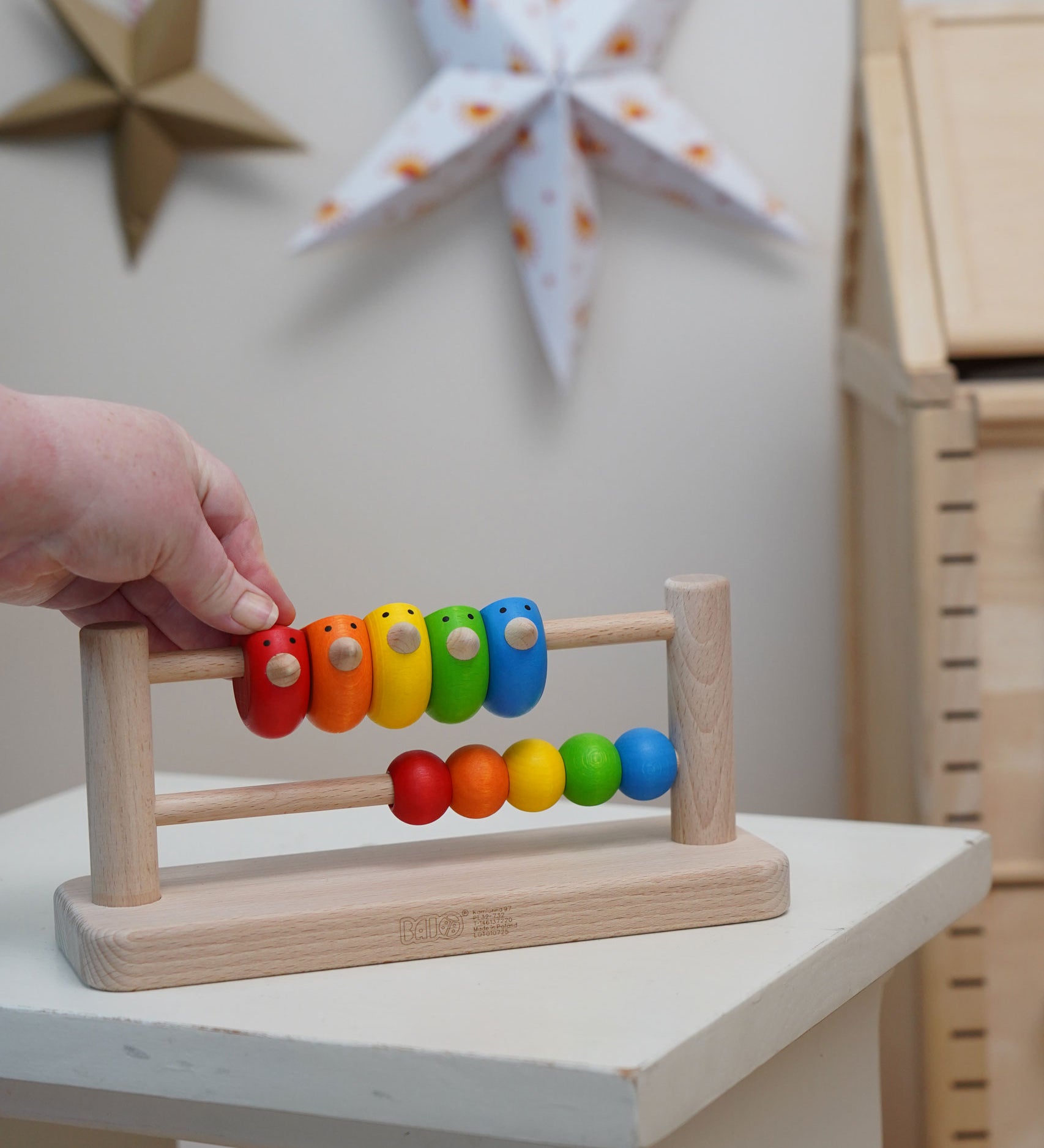 Bajo Sparrow Abacus wooden toy. This abacus has 5 little birds and 5 round counters. These heirloom quality toys by Bajo are part of a wide range of wooden toys available here at Babipur.