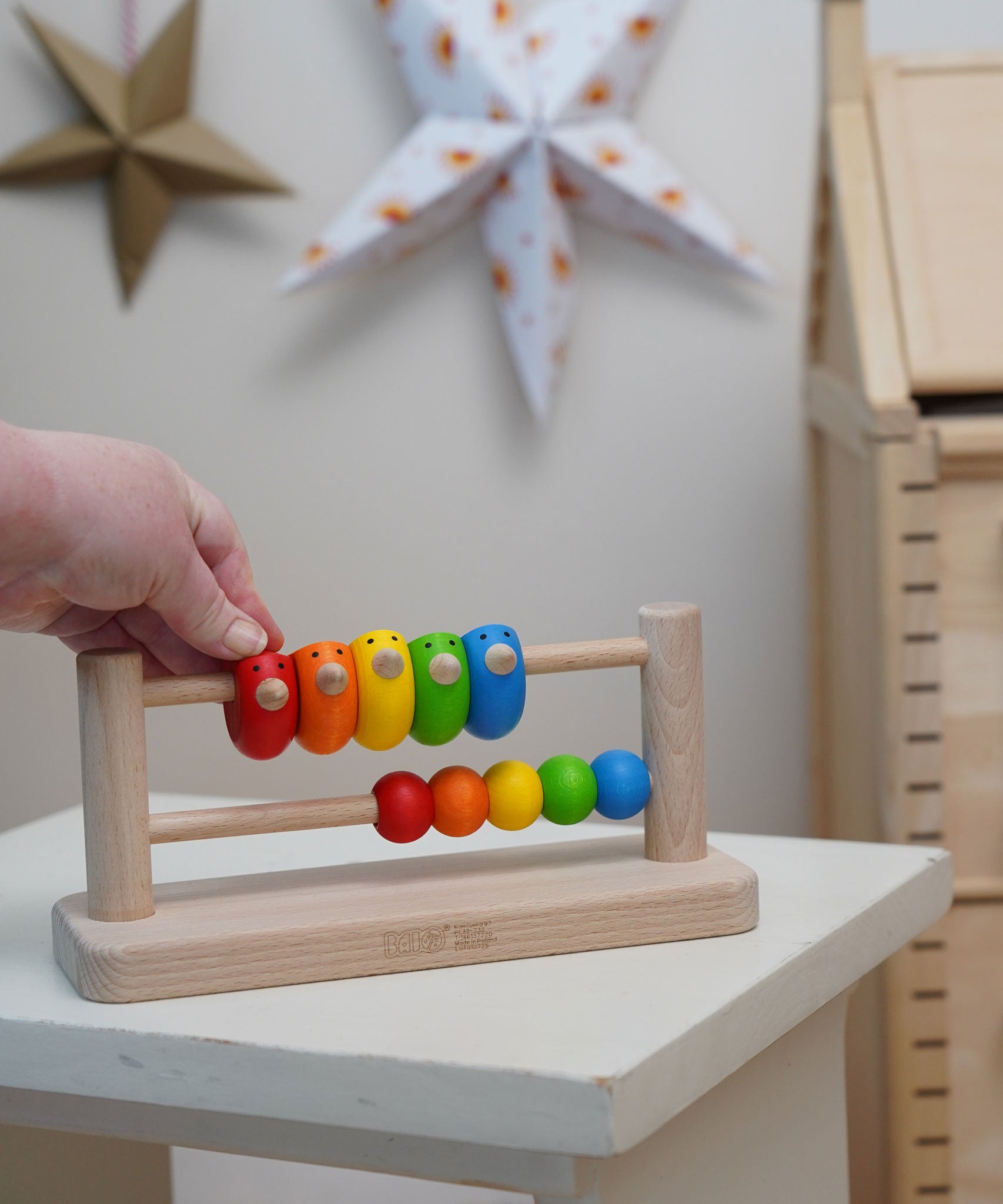 Bajo Sparrow Abacus wooden toy. This abacus has 5 little birds and 5 round counters. These heirloom quality toys by Bajo are part of a wide range of wooden toys available here at Babipur.