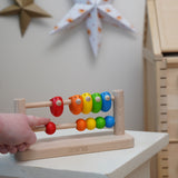 Bajo Sparrow Abacus wooden toy. This abacus has 5 little birds and 5 round counters. These heirloom quality toys by Bajo are part of a wide range of wooden toys available here at Babipur.