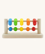 The back of the Bajo Sparrow Abacus wooden toy. This abacus has 5 little birds and 5 round counters. These heirloom quality toys by Bajo are part of a wide range of wooden toys available here at Babipur.