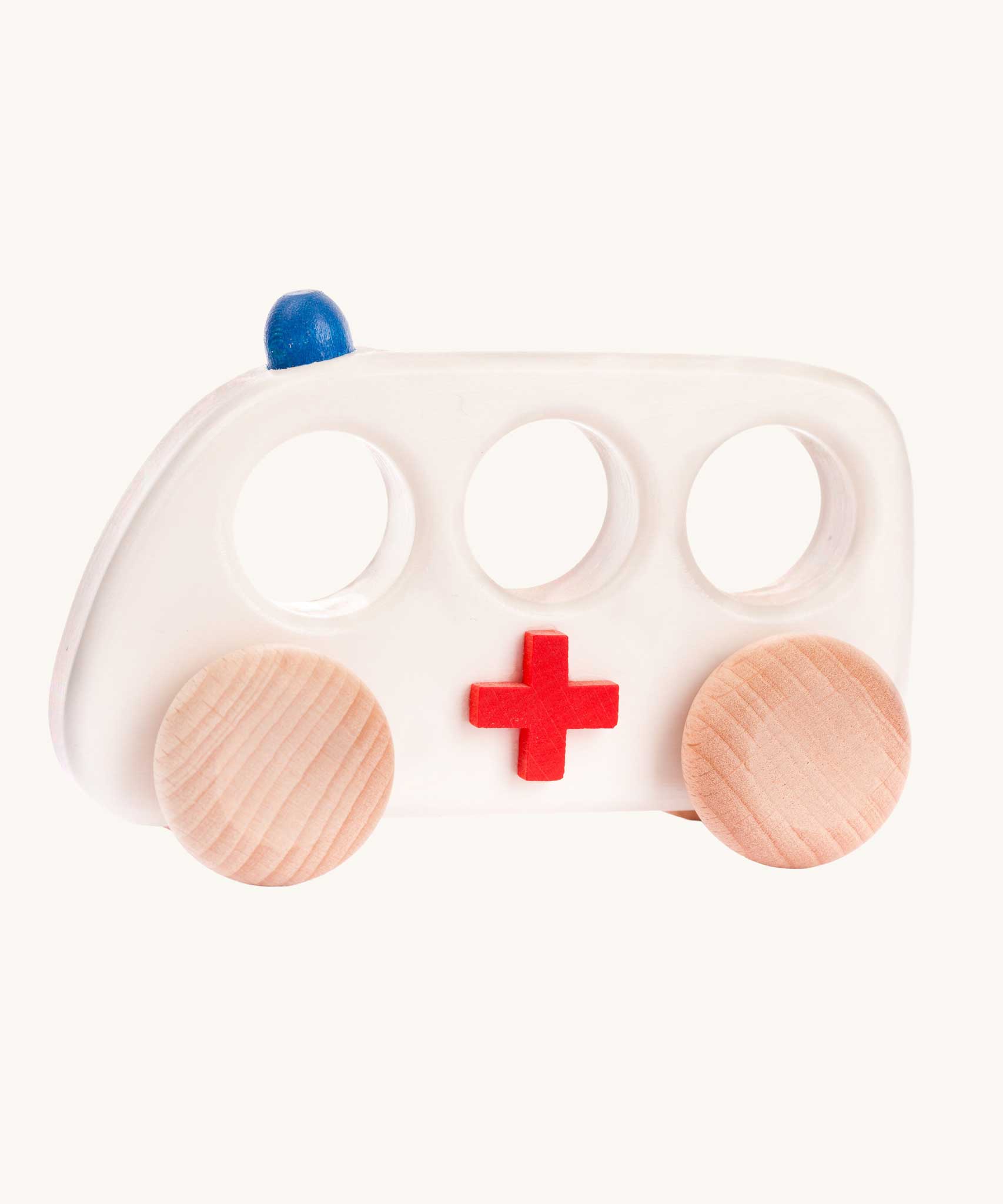 A Bajo wooden toy ambulance. These heirloom quality toys by Bajo are part of a wide range of wooden toys available here at Babipur. 