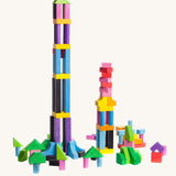Bajo 102 Blocks. A set of 102 wooden toy building blocks. The blocks have been stacked on top of each other to create a tower. These heirloom quality toys by Bajo are part of a wide range of wooden toys available here at Babipur. 