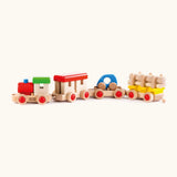 Bajo wooden train to build set. Features a DIY train and 3 carriages with removable pieces, a car and log stack