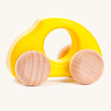Bajo handmade wooden beetle style car in yellow and available at Babipur features unpainted wheels, can be pushed or pulled along.
