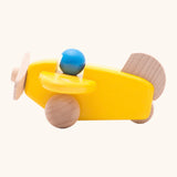 Bajo wooden yellow plane with a blue pilot, unpainted wheels, propellors and rudder