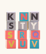 Bajo me & you alphabet blocks. Set of 12 wooden 4cm cube blocks with letters on each side.