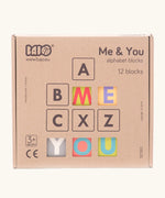 Bajo me & you alphabet blocks. Set of 12 wooden 4cm cube blocks with letters on each side in their box.