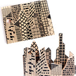 The Bajo City Puzzle is a chunky 9-piece wooden puzzle that can be used to make a striking monochrome cityscape jigsaw