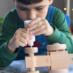 contents showing wooden tractor pieces