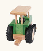 Back of Beck Holzspielzeug steerable wooden toy tractor, showing working towbar that connects Beck trailers and farm accessories.