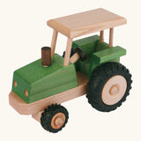 Beck green wooden tractor with a working steering wheel and black rubber tyres