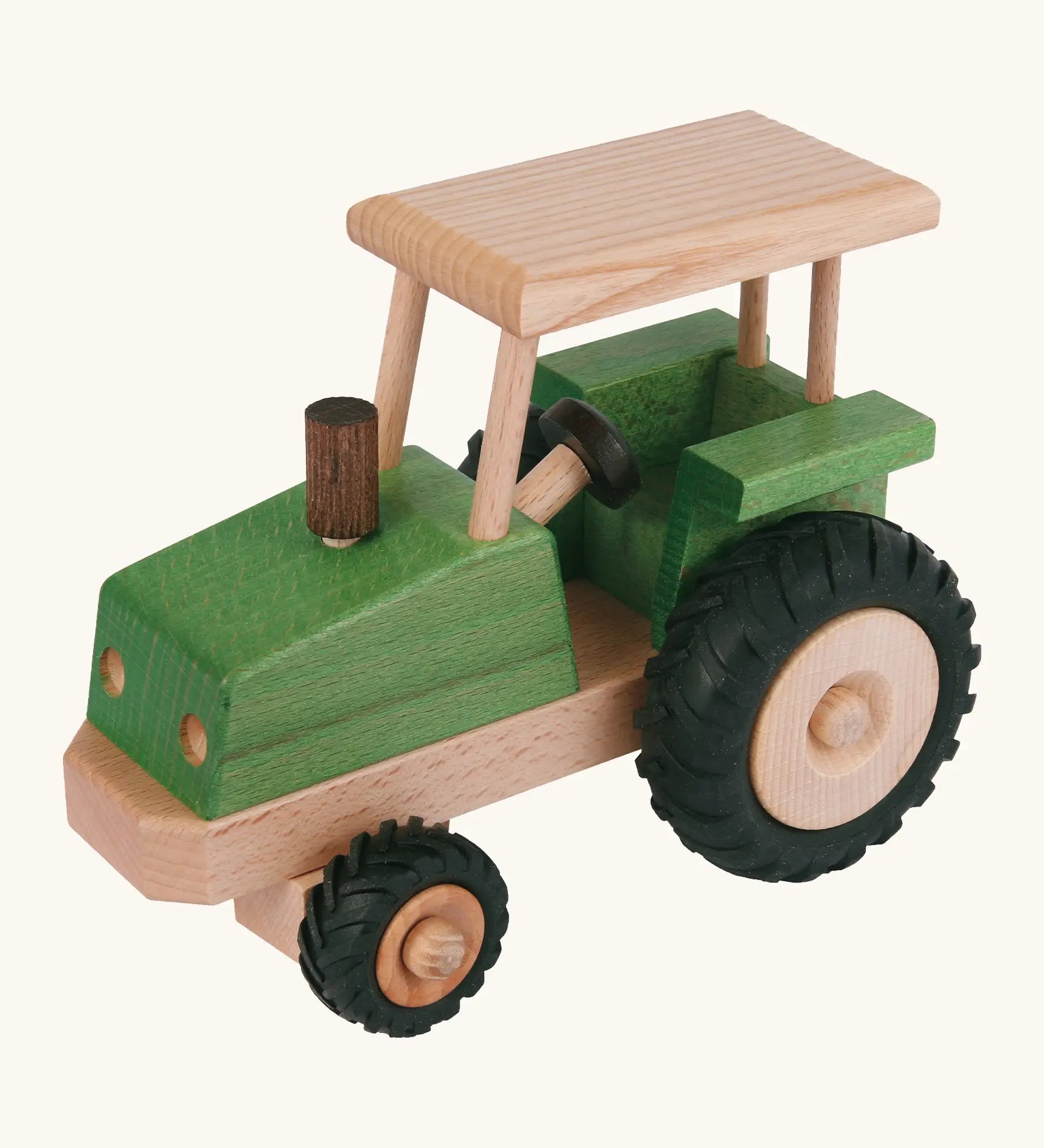 Beck green wooden tractor with a working steering wheel and black rubber tyres