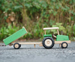 Beck Holzspielzeug wooden toy tractor and tipping trailer attachment, for farm small world play.
