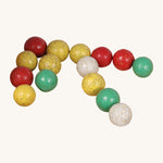 A set of different coloured clay Beck Toys marbles