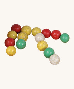 A set of different coloured clay Beck Toys marbles