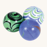 A set of 3 different coloured 20mm glass Beck Toys marbles