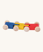 Beck Toy millipede car train showing a blue, yellow and red car attached to eachother