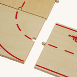 A close up of the connectors on the Beck Holzspielzeug Wooden Roads System for Toy Cars.