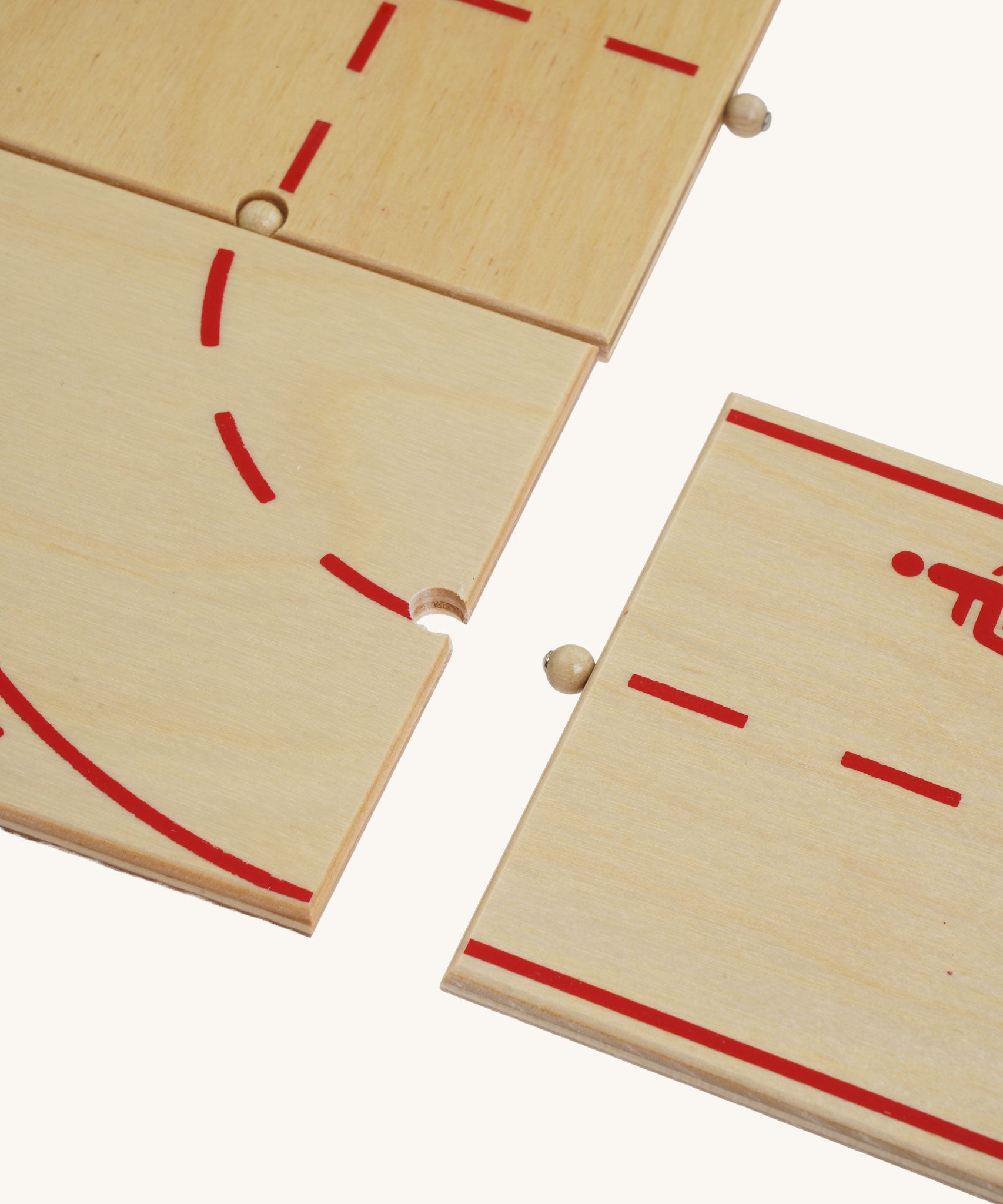 A close up of the connectors on the Beck Holzspielzeug Wooden Roads System for Toy Cars.