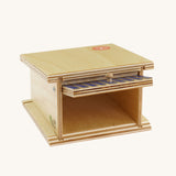 Beck Holzspielzeug Wooden Small Toy Car Garage shown with door open. This wooden toy car garage is part of a wide range of toy vehicles and accessories available at Babipur.