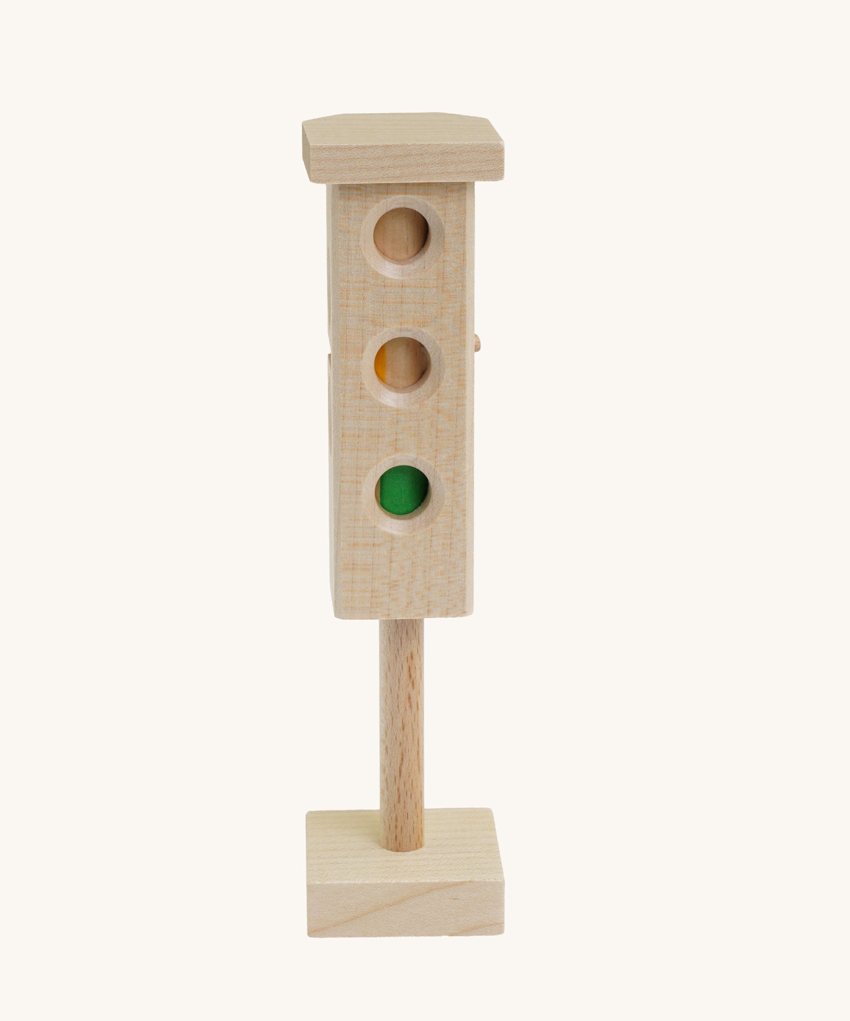 Beck Holzspielzeug Wooden Traffic Light Toy. The side featured shows the the red, amber and green lights. This wooden traffic light is part of a wide range of toy vehicles and accessories available at Babipur.