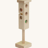 Beck Holzspielzeug Wooden Traffic Light Toy. One side features the red, amber and green lights and one features a stop and go light for pedestrian. This wooden traffic light is part of a wide range of toy vehicles and accessories available at Babipur.