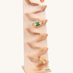 Beck Toys wooden cascading tower run for cars. Showing a tilted plank with a green and yellow car running down