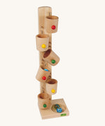 Beck toys cup marble run. A wooden set crafted from beech wood, featuring natural wooden cups along the stand that with marbles travelling down