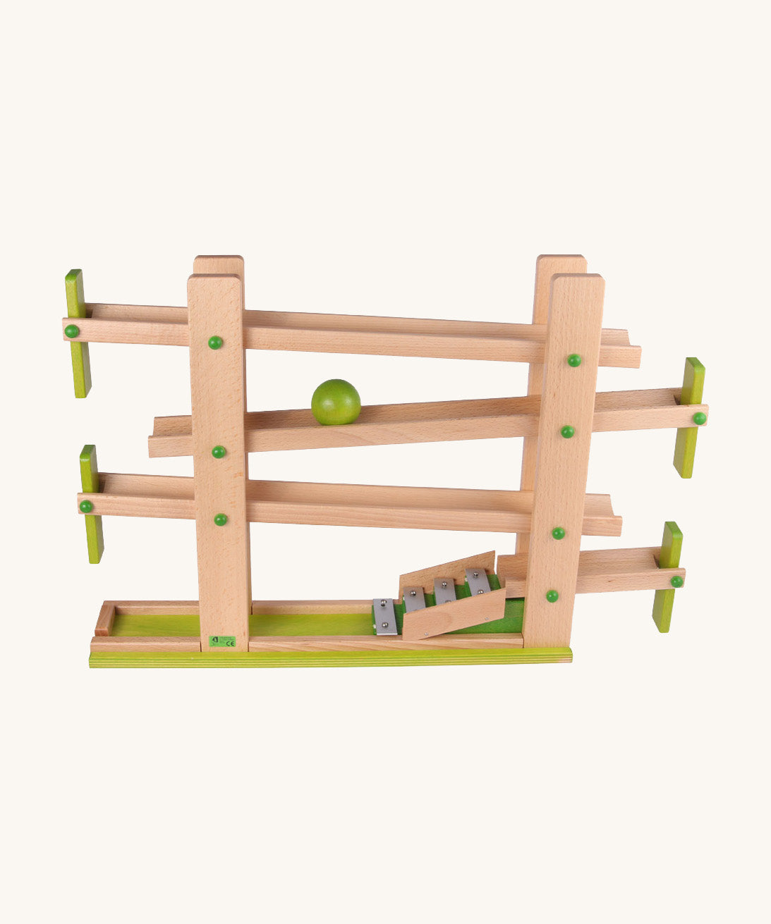 Beck Toys musical run track, a wooden toy crafted from beech wood, featuring four wooden ramp tracks with small green planks as stoppers and glockenspiel notes to finish with a green ball travelling down