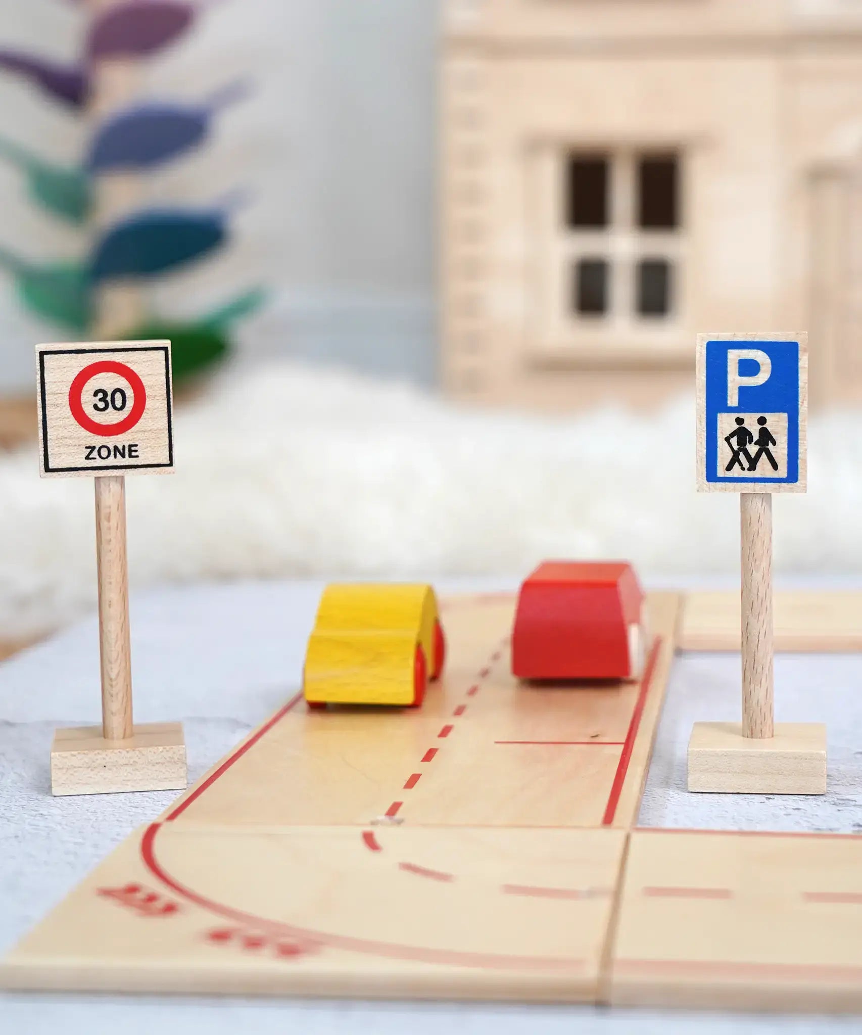 A Beck wooden speed limit and parking sign standing near a road set with vehicles on top 