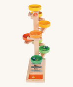 Beck Toys wooden tower marble run. Made from beech wood showing a series of coloured plates and a glockenspiel on the bottom. 
