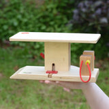 Beck wooden garage & petrol station in a child's hand.