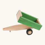 Beck wooden green tipper style trailer with a hitch for a tractor and black rubber wheels 