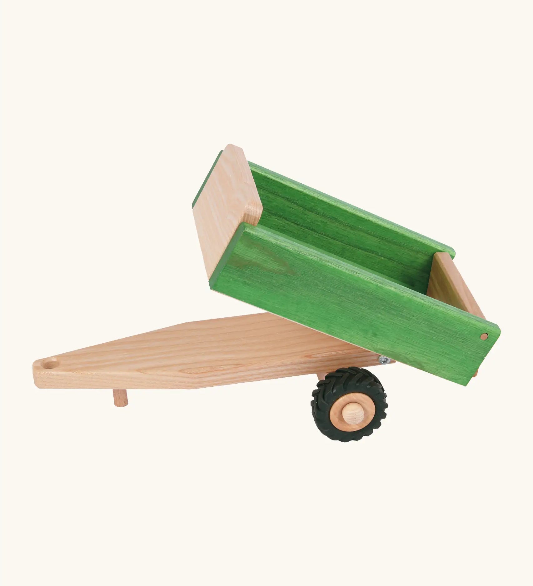 Beck wooden green tipper style trailer with a hitch for a tractor and black rubber wheels 