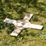 Beck wooden roundabout junction set set up and placed on grass. 
