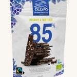 Belvas Belgian Dark Chocolate Thins 85% cocoa, fairtrade and organic. A white packet with blue decorations and an image of the chocolate thins in the centre. Cream backround. 