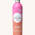 Ben and Anna shower gel in berry infusion fragrance showing the playful design on a pink and orange gradient aluminium bottle   