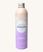 Ben and Anna shower gel in magnolia breeze fragrance showing the playful design on a lilac and peach gradient aluminium bottle   