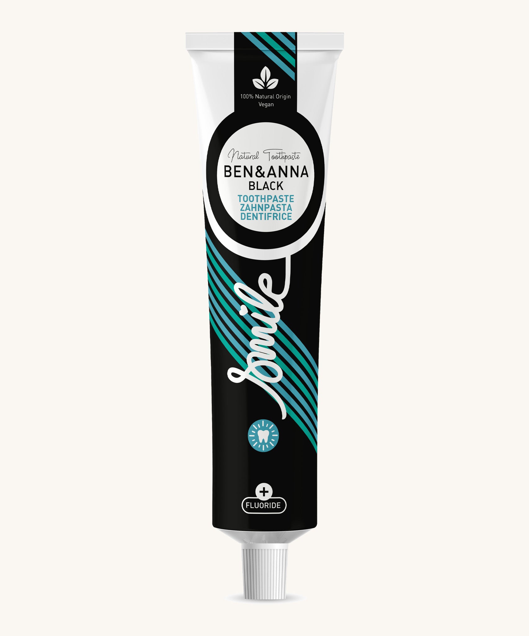 Ben & Anna certified 100% natural activated charcoal toothpaste showing a black, green and blue stripe design on the tube with a playful smile slogan in white in the middle.