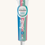 Ben & Anna certified 100% natural toothpaste in coco mania. Showing a blue, pink and green striped design on the tube. Features a playful smile slogan in white in the middle.