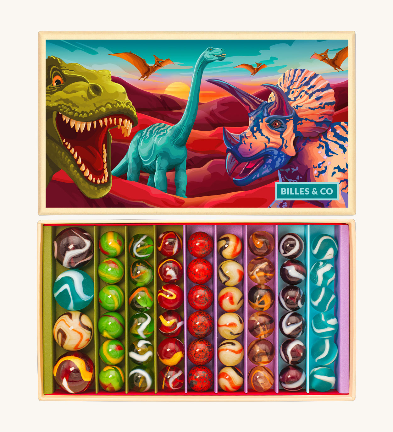 The Billes & Co large collectible glass marbles box, with a dinosaur theme. The box is open to show the different types and colours of glass marbles, next to the lid that is illustrated with colourful dinosaurs.