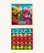 The opened Billes & Co collectible glass marbles minibox with a dinosaur theme showcasing the different coloured marbles inside, next to the colourful illustrated box.