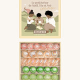 Billes & Co marbles and Babyatoutprix collaboration set. Features 30 pastel coloured glass marbles including green pink and white with a mix of textured marbles. Comes in a artistic  box showing 3 people playing marbles on a field with a castle in the background.