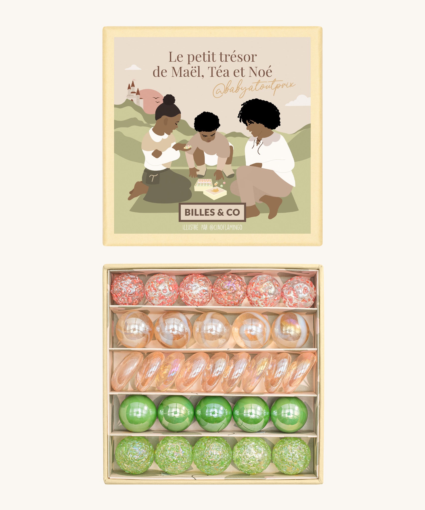 Billes & Co marbles and Babyatoutprix collaboration set. Features 30 pastel coloured glass marbles including green pink and white with a mix of textured marbles. Comes in a artistic  box showing 3 people playing marbles on a field with a castle in the background.