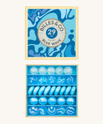 Billes & Co marbles in a orange wave inspired design. Features 29 blue and white glass marbles with a mixture of textured and flat marbles. Comes in a matching decorative box. 