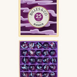 Billes & Co marbles in a manoir inpsired design. Features 25 purple and blue glass marbles and a matching spooky themed box. 