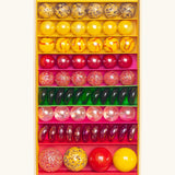 Billes & Co Katerina Matriochka doll inspired marbles in shades of pink, green and yellow